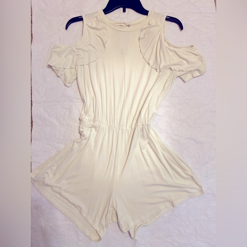 White one piece romper. Cotton. Juniors L. Never worn. From Marshall’s